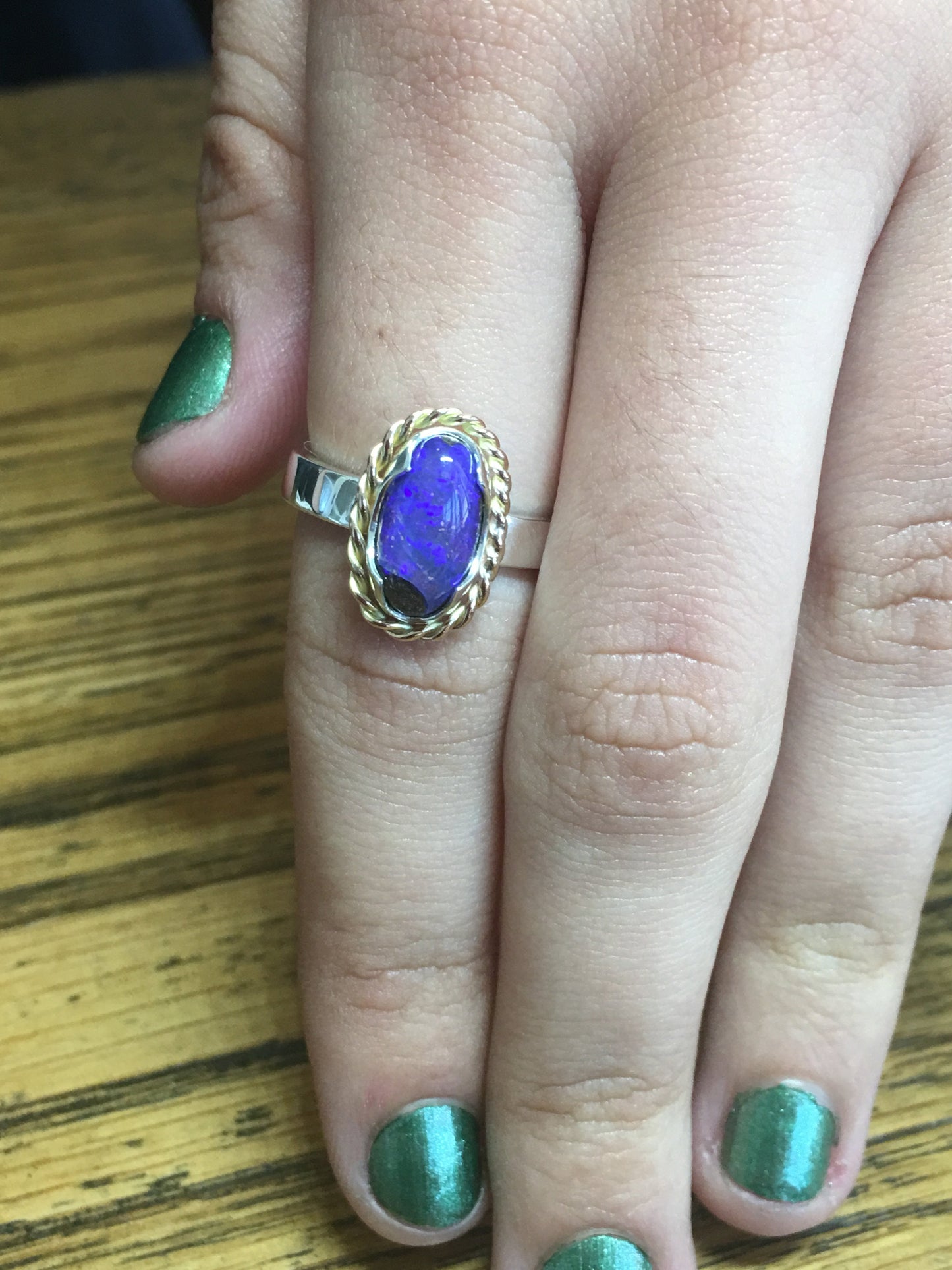 9ct rose gold twist and silver band with a blue Queensland Boulder Opal. Australian made and handcrafted using local and ethical products.