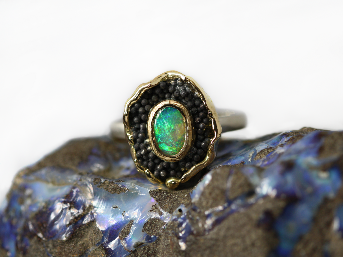 green Queensland boulder opal in silver and 18ct Yellow gold. blackened silver balls. Australian made and handcrafted in our brisbane studio using ethically sourced materials.